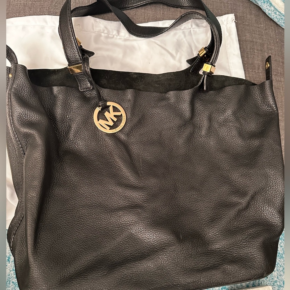 Black leather Michael Kors bag.